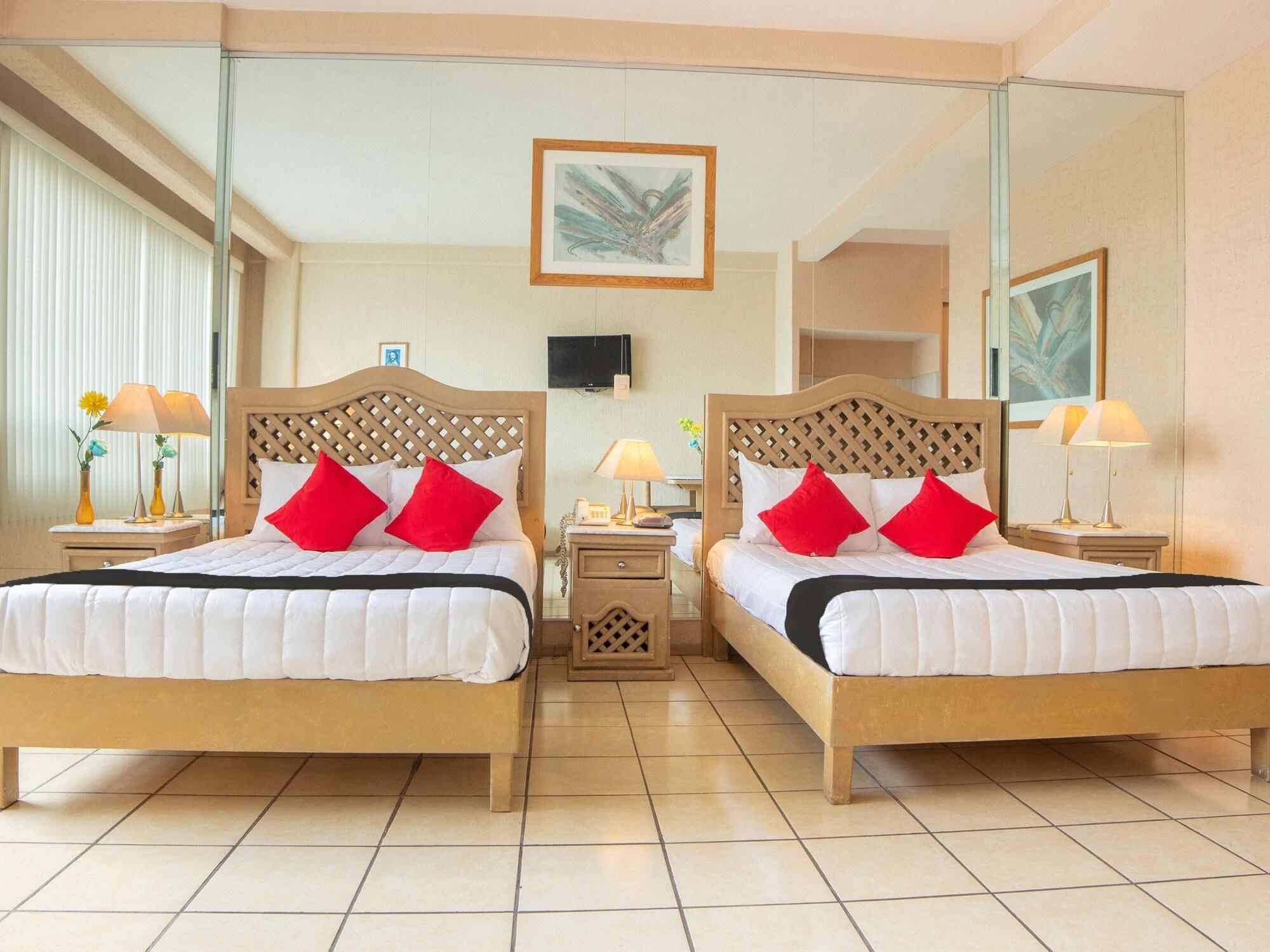 Capital O Hotel Villa Monini