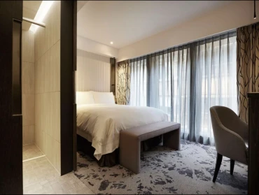Em Casa Hotel