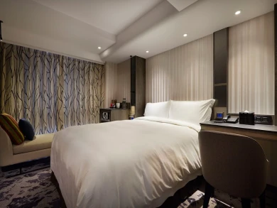 Em Casa Hotel