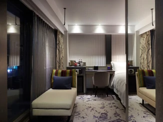 Em Casa Hotel