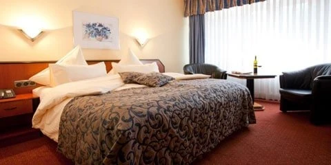 Carathotel_Munich_City-bedroom Carat Hotel & Apartments